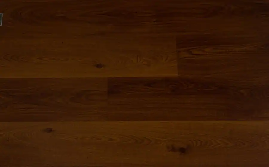 Close-up view of rich dark wooden flooring texture for interior design.